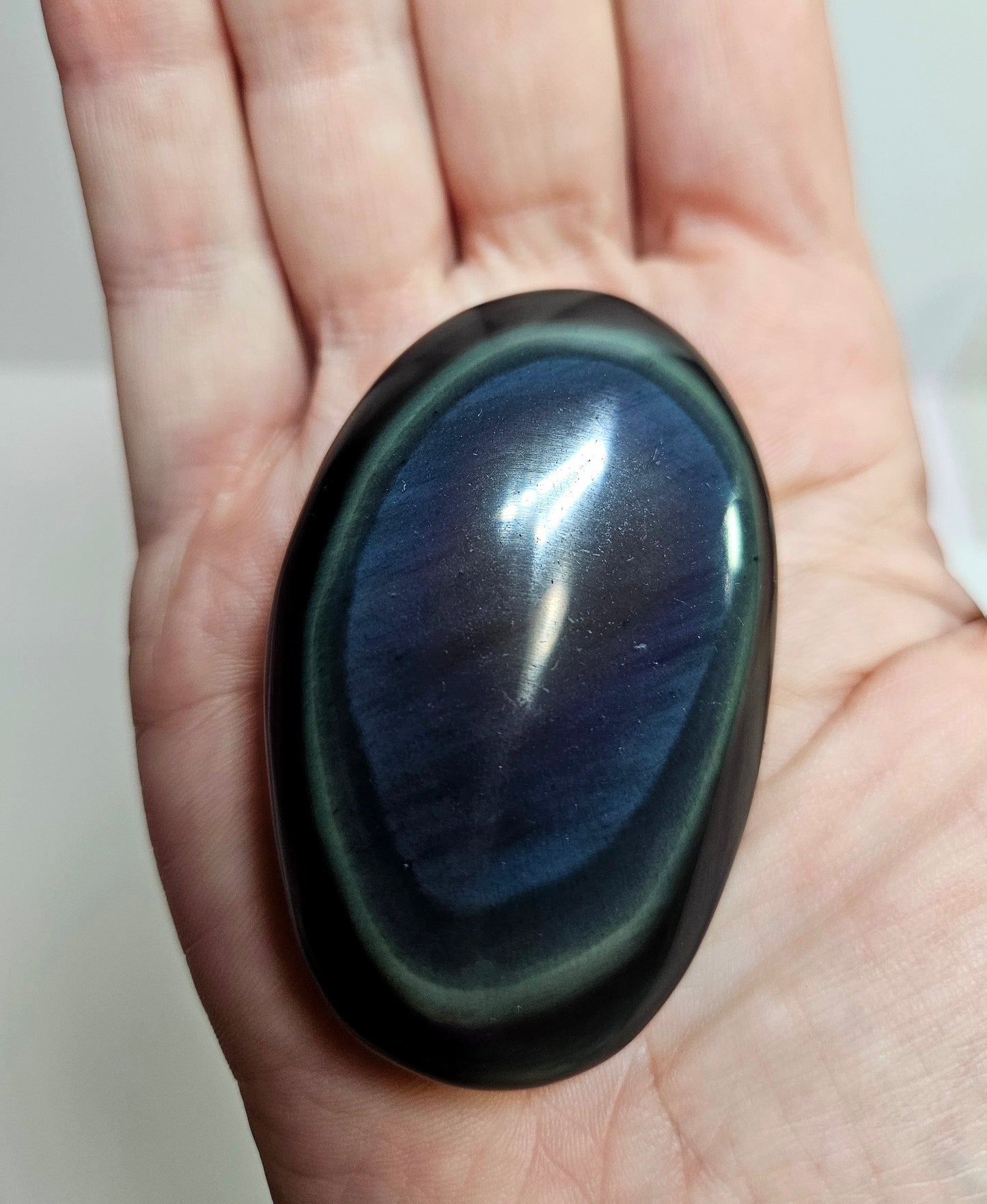 Rainbow sheen obsidian palm stone