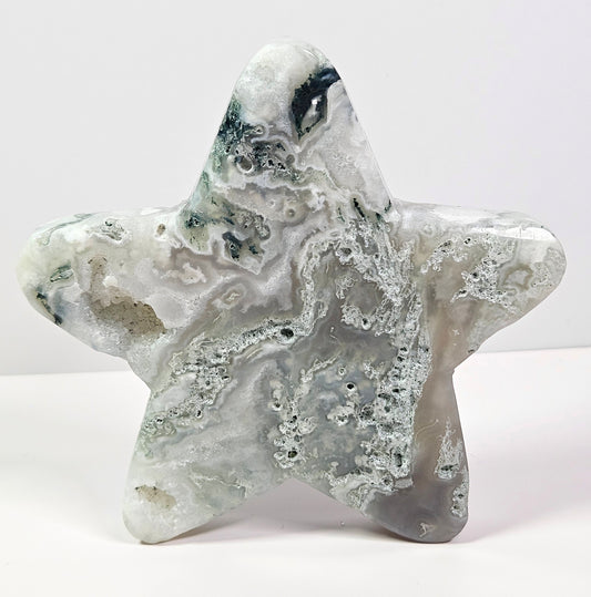 Moss agate star carving