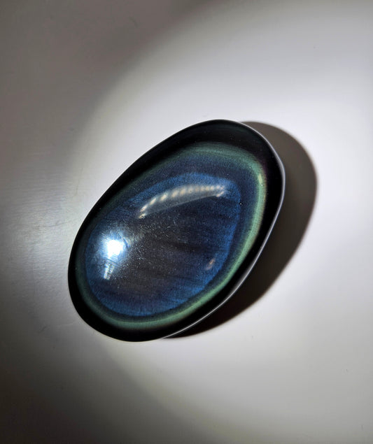 Rainbow sheen obsidian palm stone
